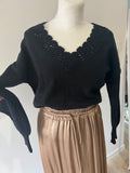 Pull noir broderie